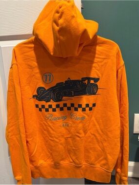 American Eagle Outfitters Orange Zip-Up Hoodie with Navy Racing Graphic